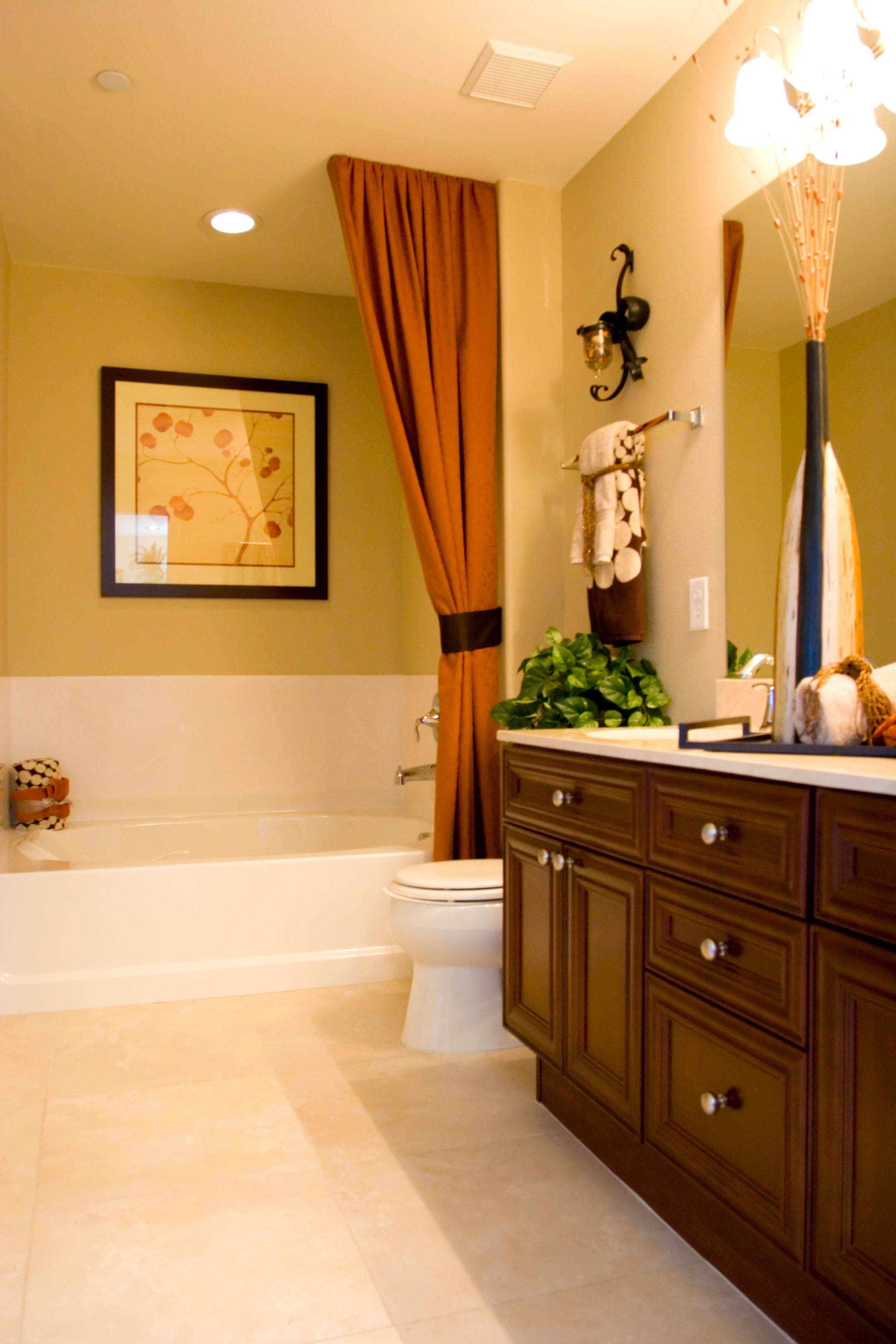 decorated bathroom with tile floor 